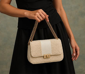 Trendy small shoulder bag styled with a chic dress
